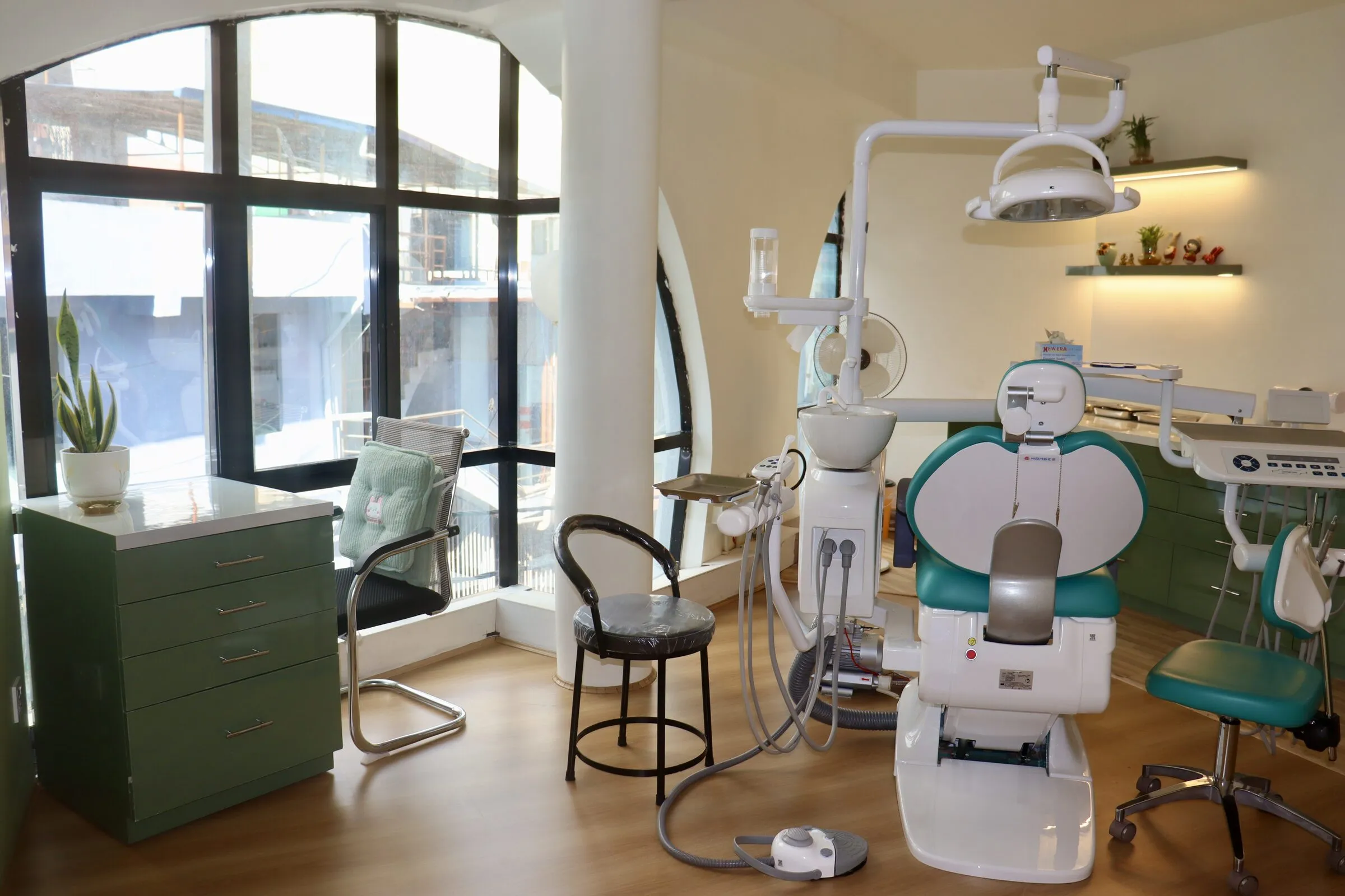 Bright treatment room with large windows